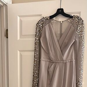 Gorgeous Pamella Roland gown NWT. Size 6.. split draped front